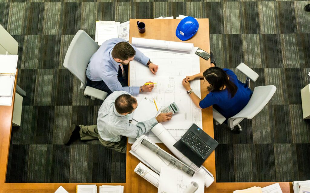 People sitting down around a table.