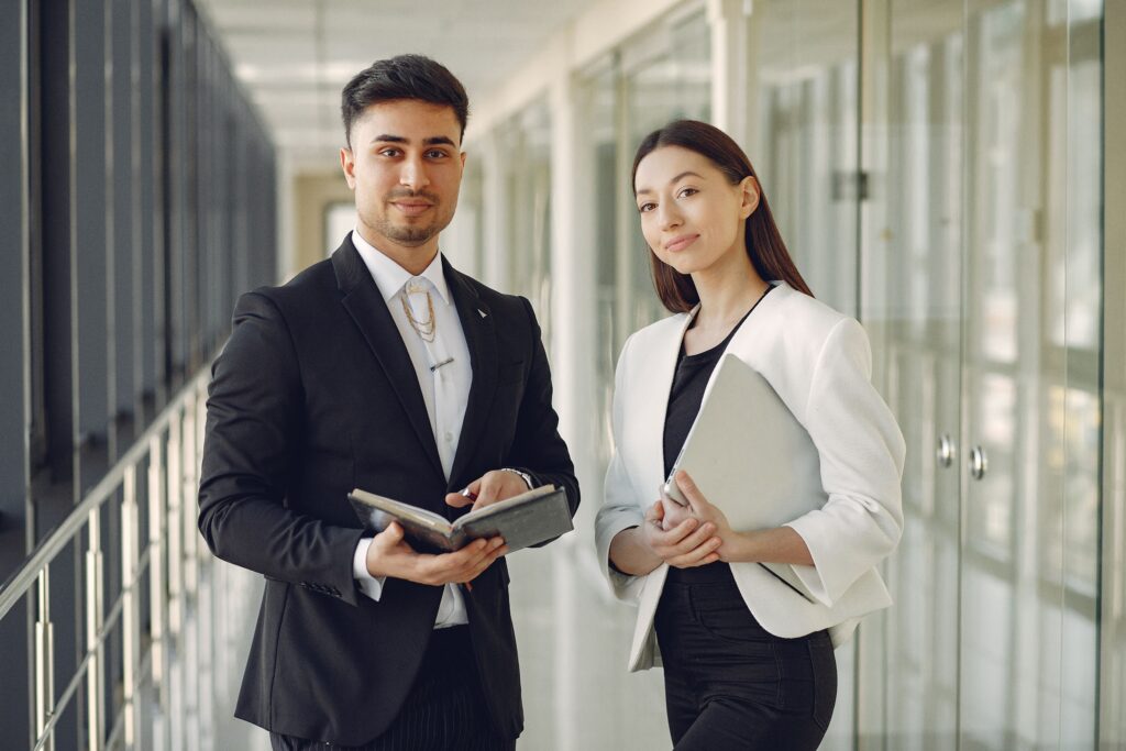 Two people in a modern office.